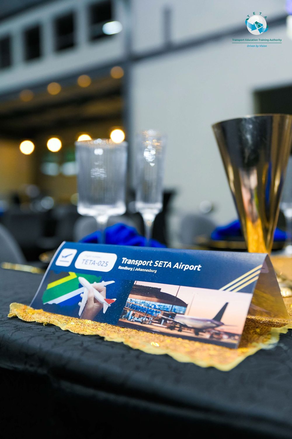 Boarding-pass style table card reading Transport SETA Airport, flight TETA-025